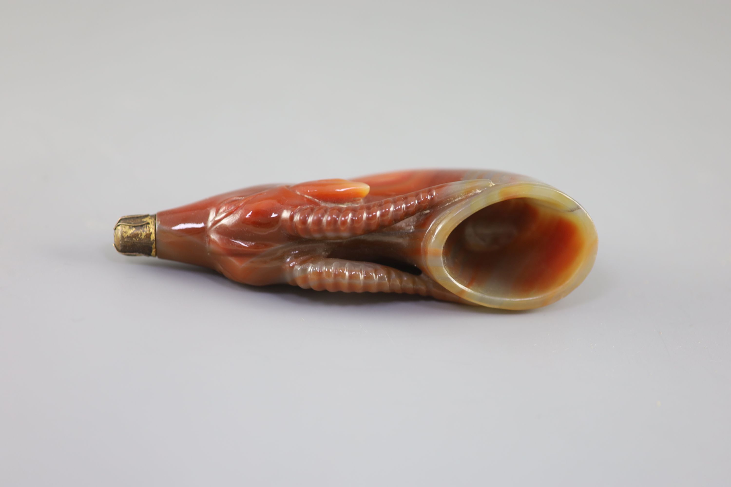 A Chinese chalcedony 'antelope' rhyton, late Qing dynasty, 14.5 cm long